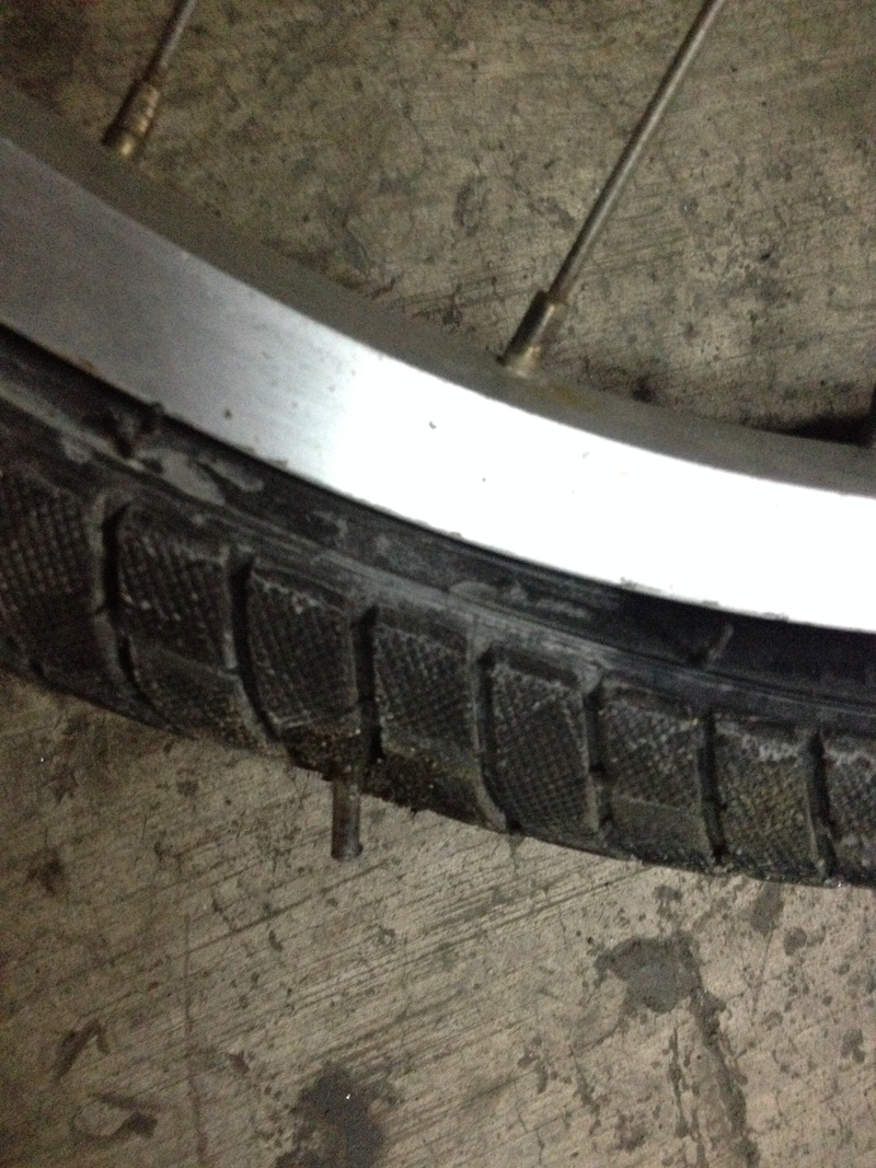 Illustration for article titled Yesterday's DOTS + punctured bike tire